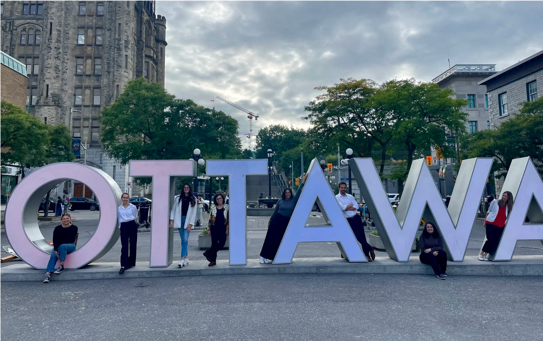 Isenberg Lab team at the OTTAWA sign